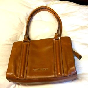 Ladies tan purse,  leather. Pockets galore.